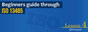 Blue header banner for "Beginners guide through ISO 13485" Lesson 4, featuring the qmsWrapper logo and a globe graphic illustrating international medical device management standards.